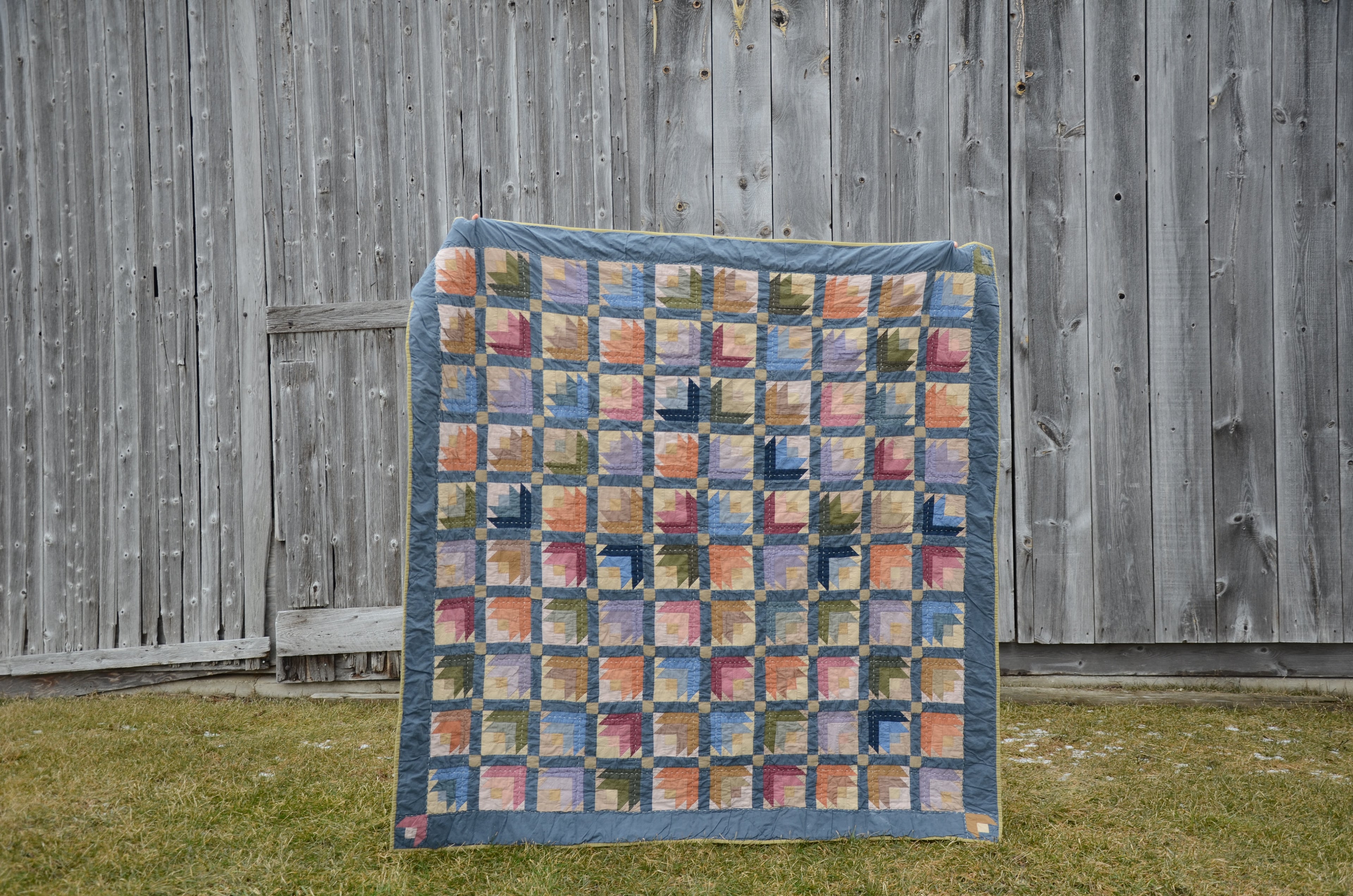 Handmade modern heirloom quilt with 100 flower blocks